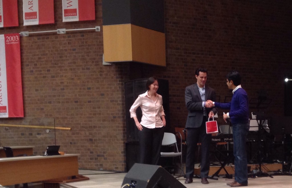 Minister Naqvi accepts a token of appreciation from L&L President Dylan McGuinty.  