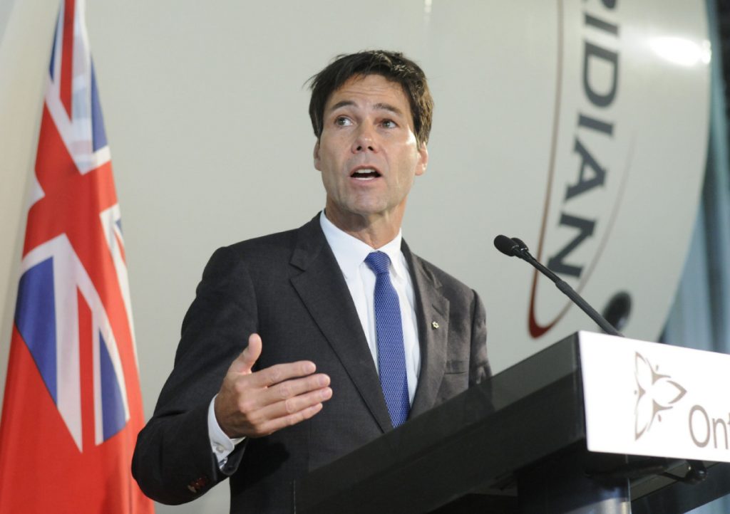 Cambridge, Ontario - 21-02-14 -  bu-meridian-21 Summary:Ontario Trade Minister Eric Hoskins making announcement at Meridian Manufacturing in Cambridge. Photos at Meridian Manufacturing on Sheldon Dr.. Behind Hoskins is a smooth walled grain bin. Ontario Trade Minister Eric Hoskins is making an announcement there. The company makes hopper bins and other metal storage tanks. Some pics with John Milloy and Ken Kingston, Operations Manager, Meridien Manufacturing. [Peter Lee, Record staff - story by Terry Pender] Waterloo Region Record - shot 1:39:43 PM-21-02-14-Friday-Cambridge