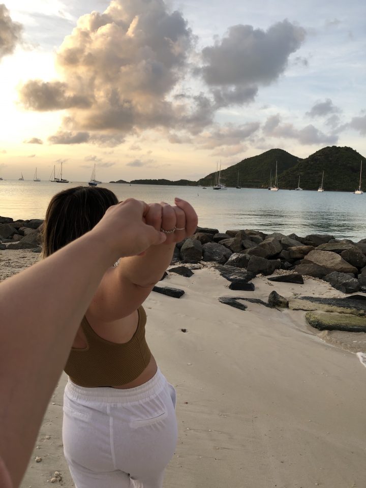 A picture of a girl holding the photographers hand in Antigua.
